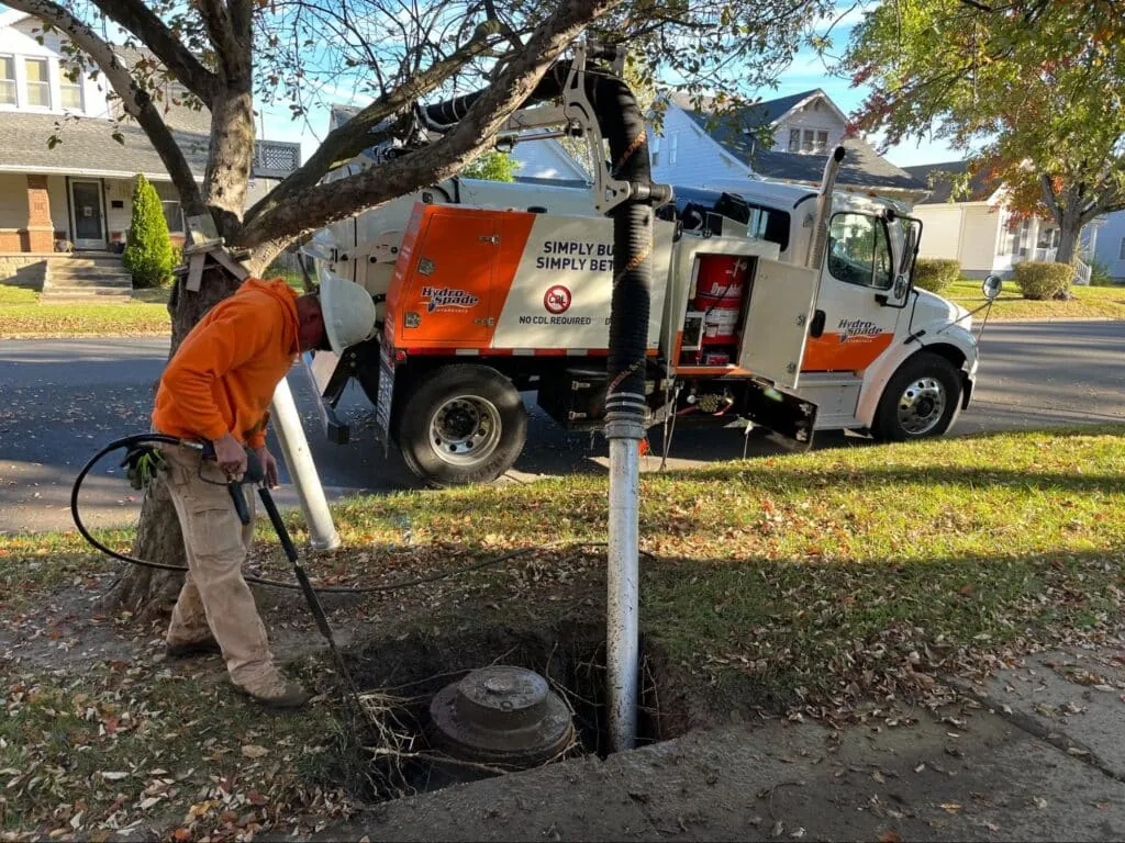 Utility maintenance worker ensuring safety and efficiency during service operations.
